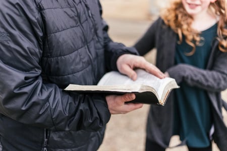 people reading the bible with Replicate discipleship resources